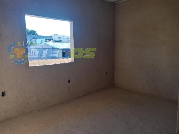 casa em fase de acabamento composta por: 2 dormitórios, 2 banheiros, cozinha estilo americana  varanda em L, garagem coberta para 2 carros, quintal. loja em baixo com entrada individual. Foto 14